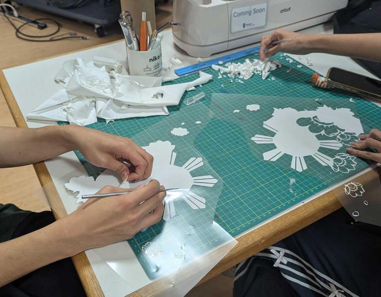 Weeding vinyl to prepare for heat transfer