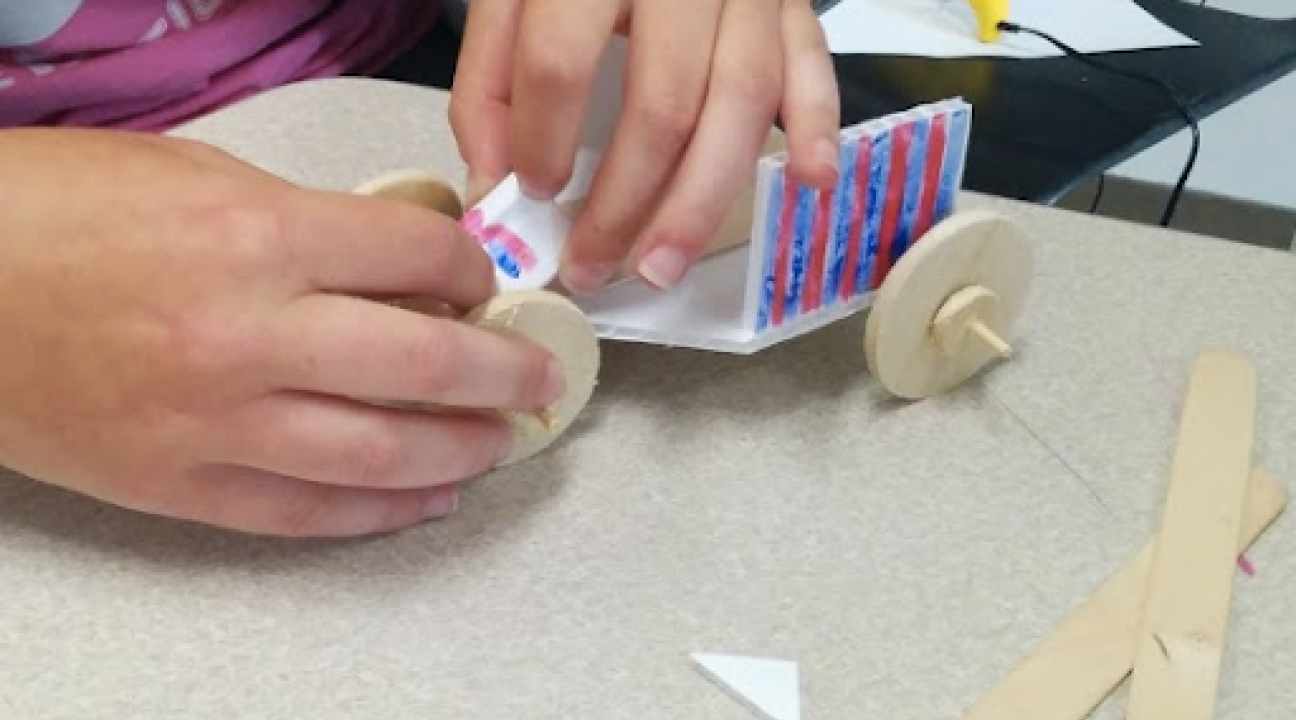 Toy car being built.
