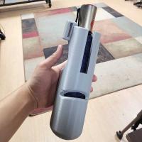 Plastic container with an umbrella inside.